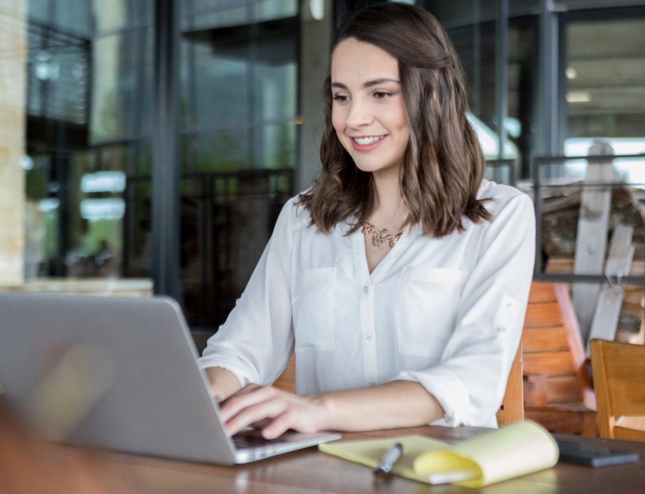 Business girl working in her computer