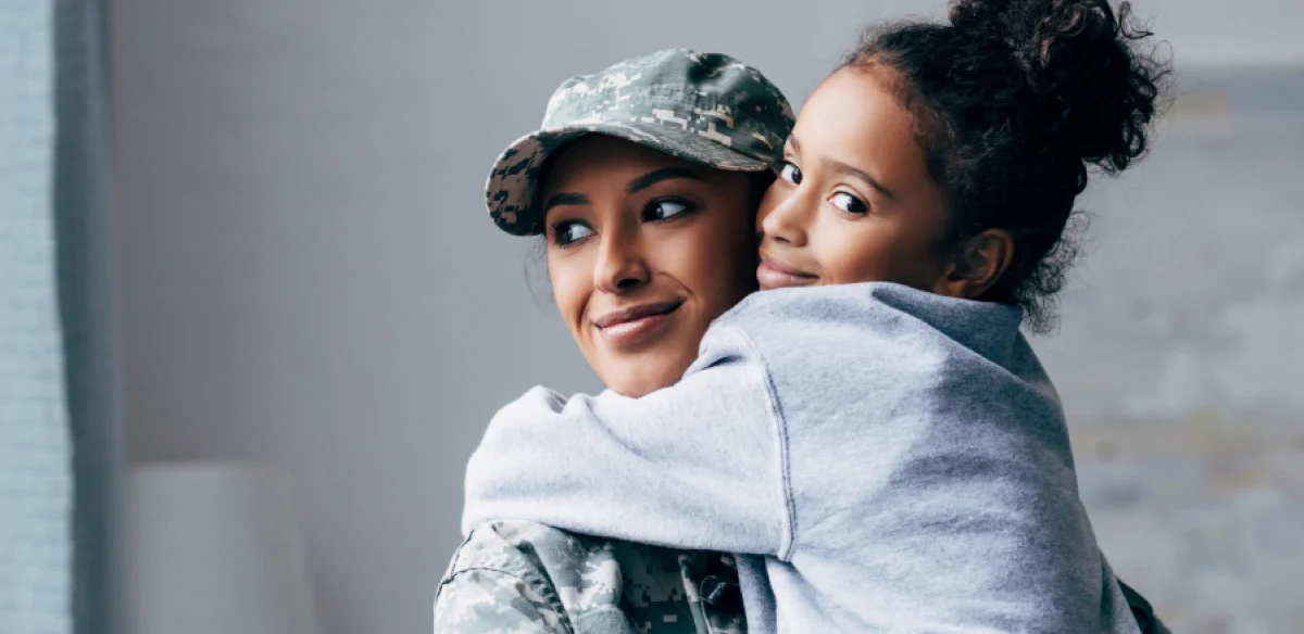 Military with little girl
